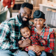 Jason Edwards, left, Kristian Henderson and son August Tylear.